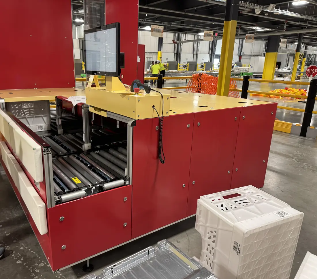 Automated warehouse floor with conveyor and sortation systems